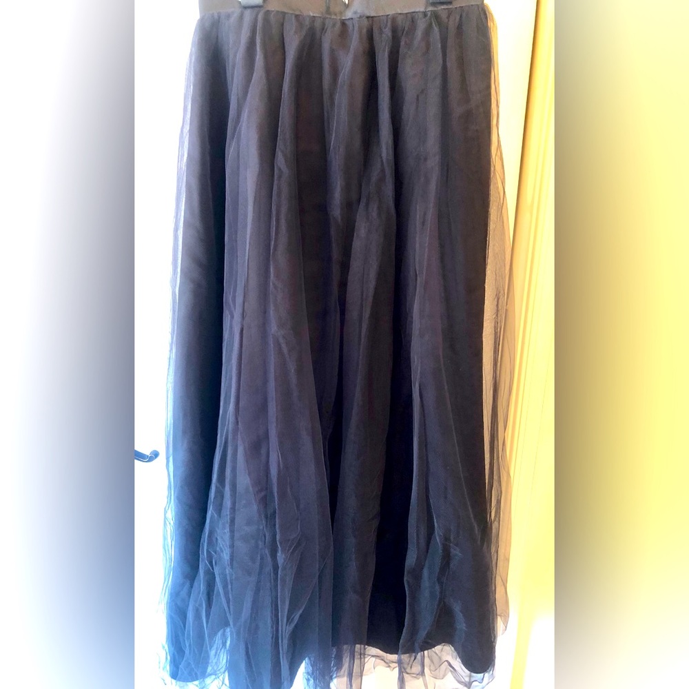Long black tulle skirt.